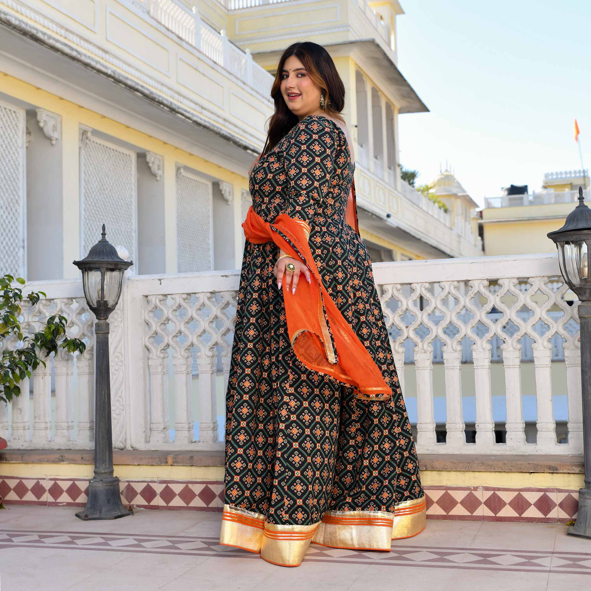 Madhuban- Patola Black with Orange Anarkali Madhuban- Patola Black with Orange Anarkali