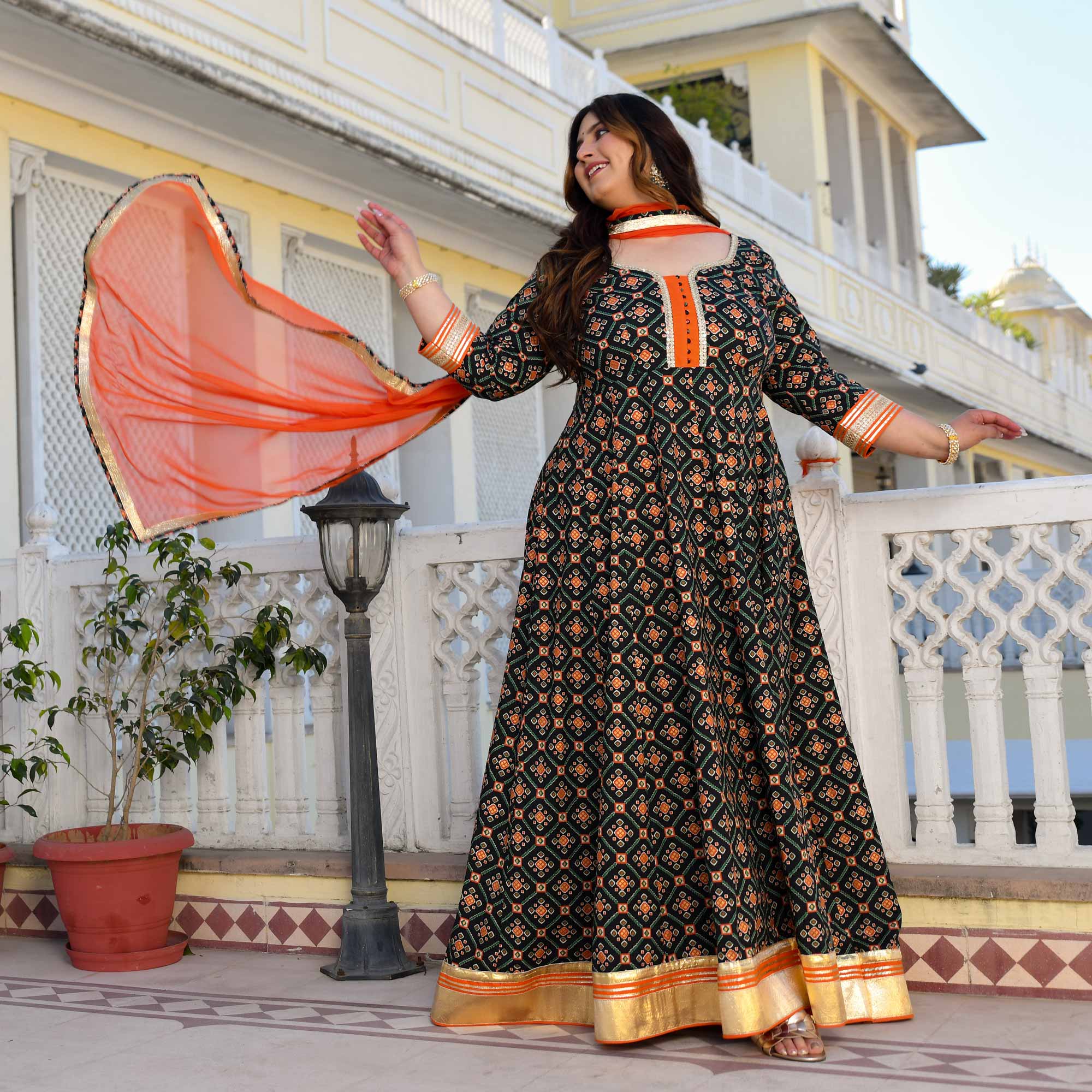 Madhuban- Patola Black with Orange Anarkali Madhuban- Patola Black with Orange Anarkali