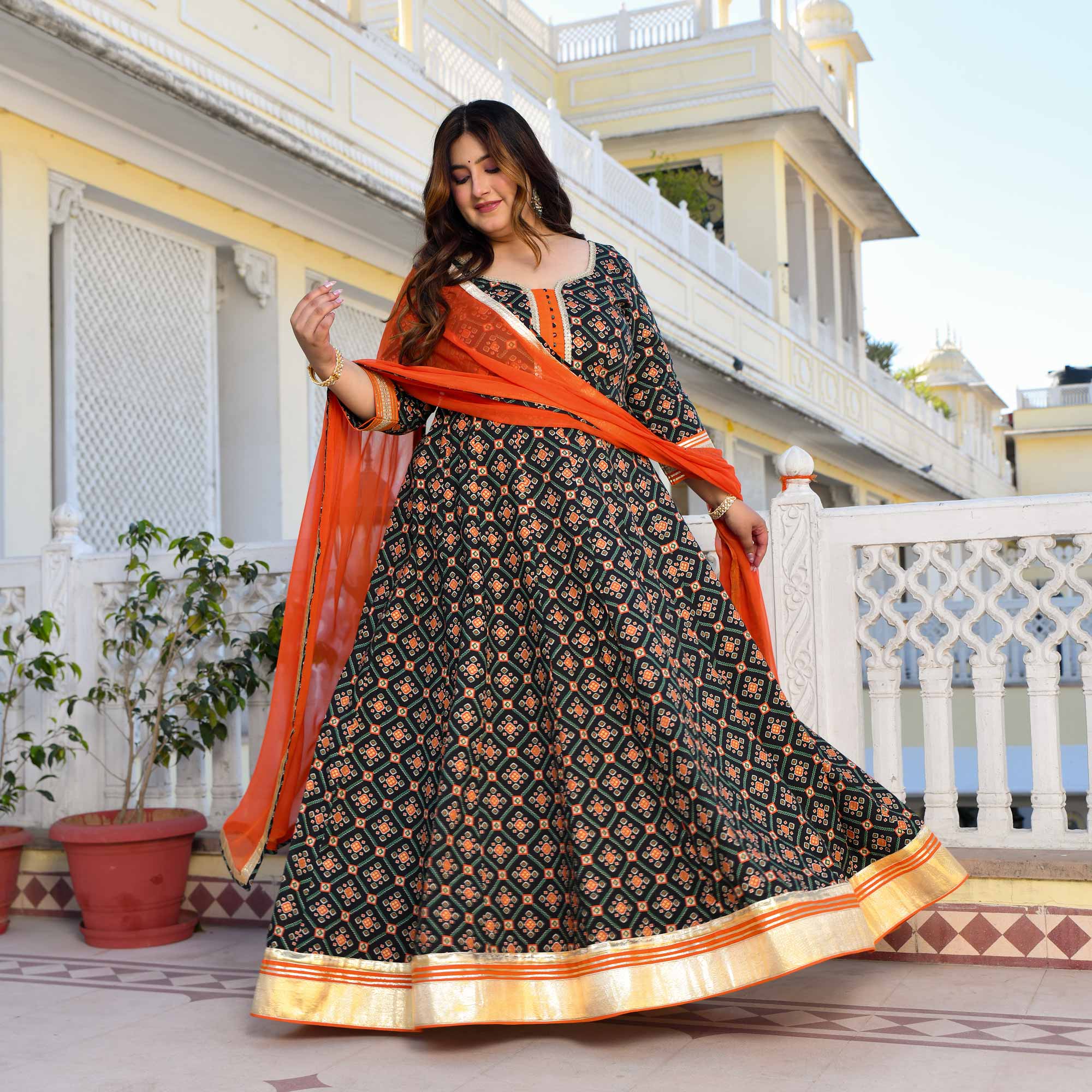 Madhuban- Patola Black with Orange Anarkali Madhuban- Patola Black with Orange Anarkali