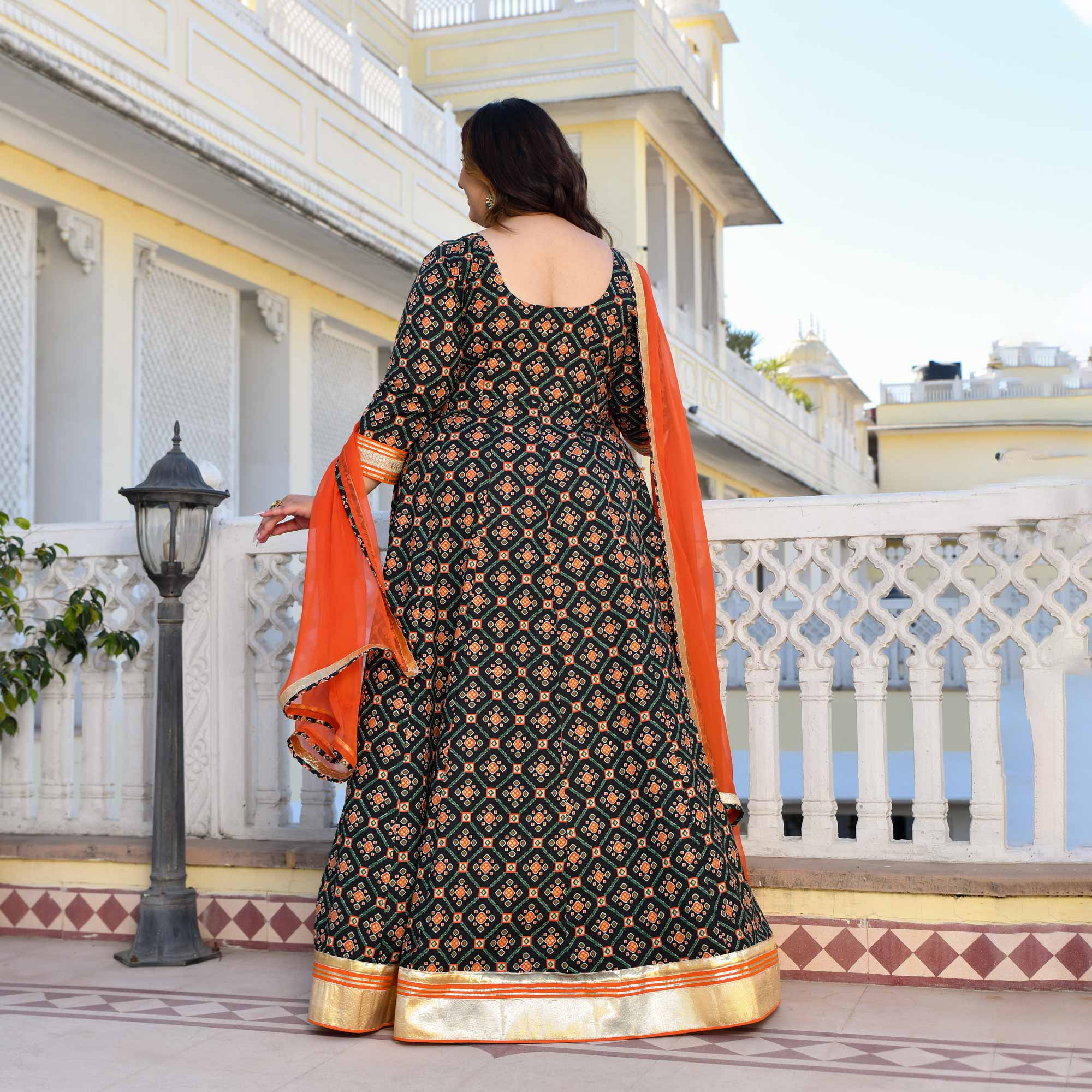 Madhuban- Patola Black with Orange Anarkali Madhuban- Patola Black with Orange Anarkali