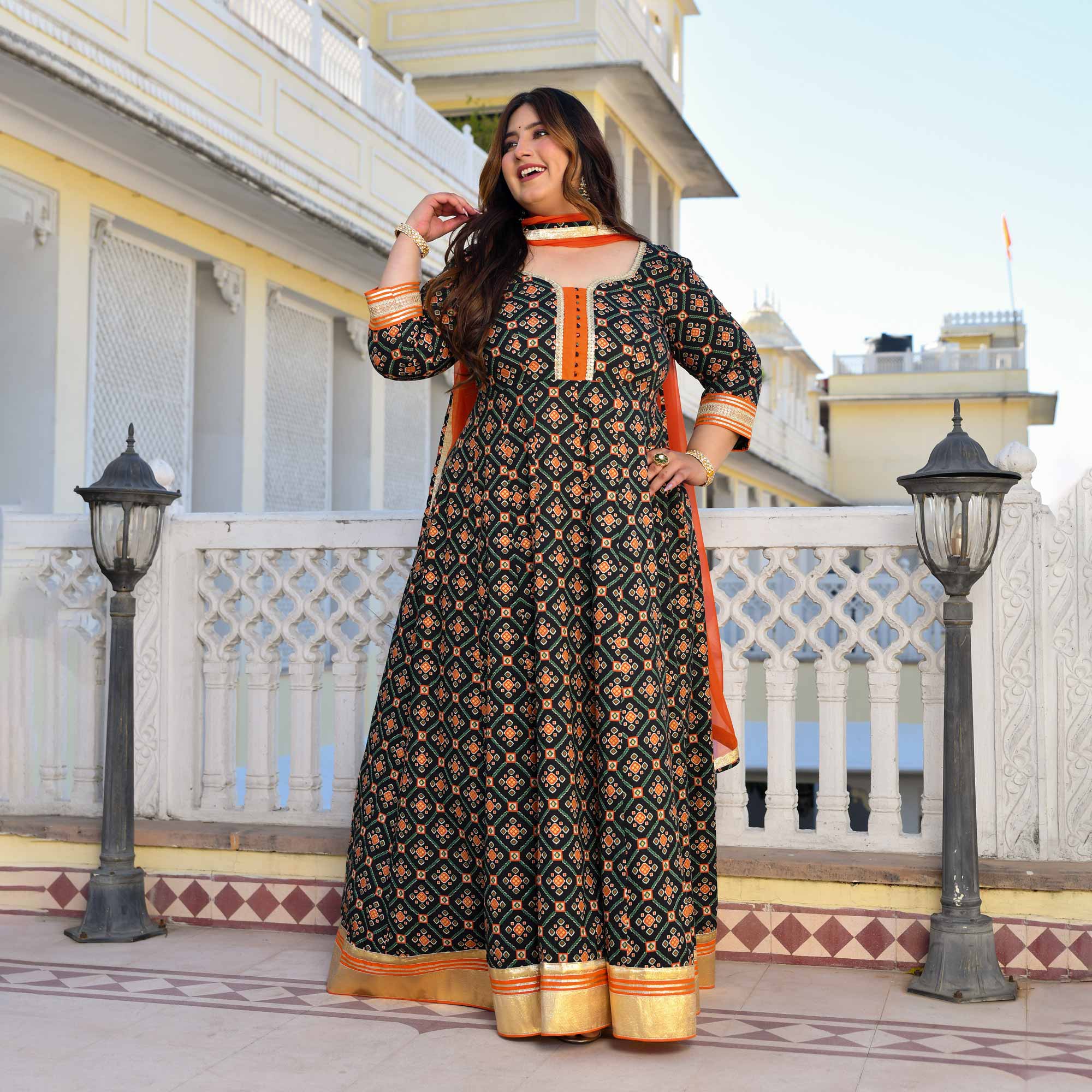 Madhuban- Patola Black with Orange Anarkali Madhuban- Patola Black with Orange Anarkali